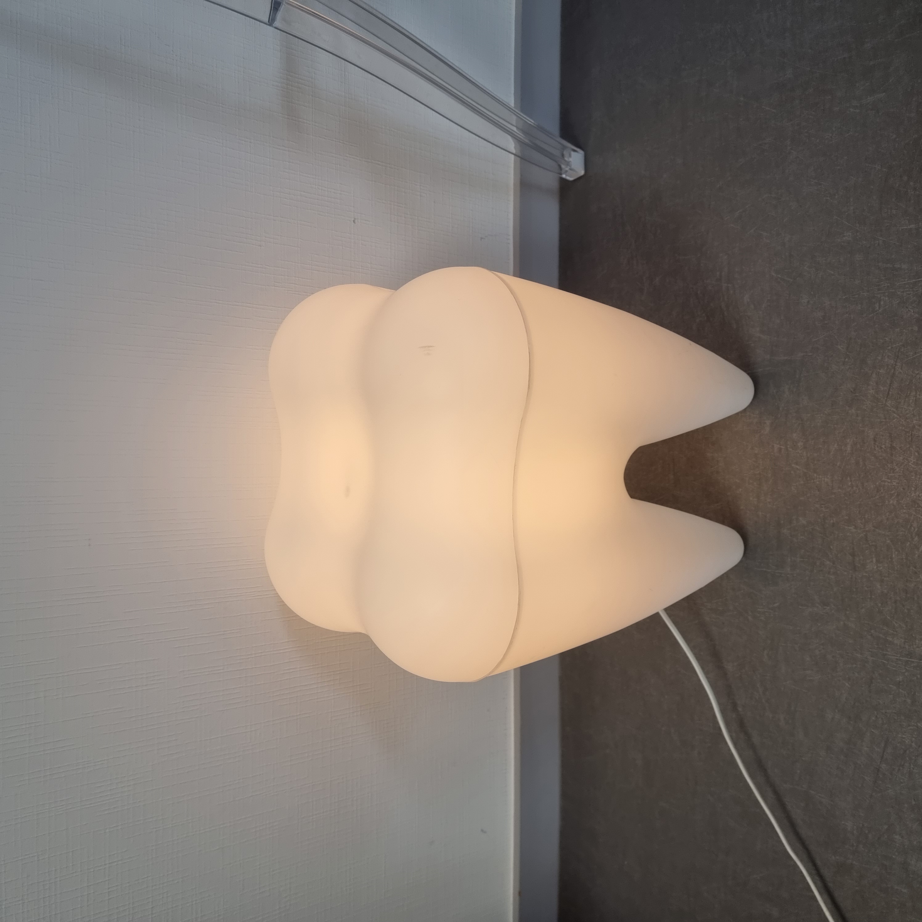 Photo d'une lampe dent lumineuse